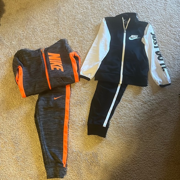 Little boy, size 4 Nike suits.Excellent condition